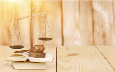 Law scales on table background. Symbol of justice