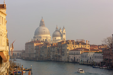 Fototapeta na wymiar View to the Grand Canal and Basilica di Santa Maria della Salute from the Ponte dell'Accademia in Venice, Italy