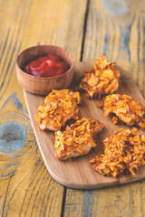 Barbecue chicken bites with ketchup