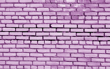 Brick wall surface in purple tone.