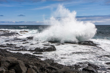 Beautiful splash from a broken on the volcanic rocks waves, Portugal, Atlantic Ocean