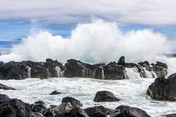 Beautiful splash from a broken on the volcanic rocks waves, Portugal, Atlantic Ocean