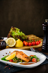 salmon fillet with vegetables in a restaurant