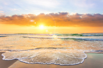 Amazing sunset on a sandy tropical beach.