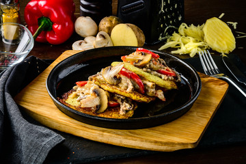 homemade potato pancakes, Vegetable fritters. Latkes in frying pan