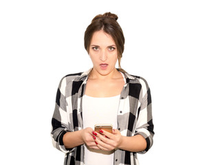 Portrait angry young woman with mobile phone, Isolated on a white background. Negative emotions feelings