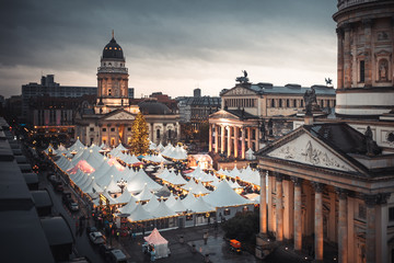 Gendarmenmarkt Christmas market, Deutscher Dom and konzerthaus in Berlin, Germany © Vitaly
