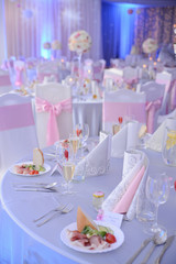 appetizer a ham and a beautiful table setting at a wedding