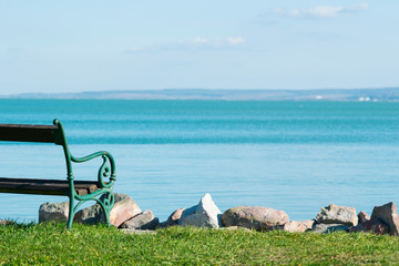 lakeside bench at october indian summer