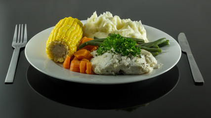 poached fish with fresh vegtables 