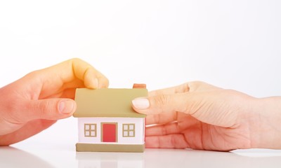 Building, mortgage, real estate and property concept - close up