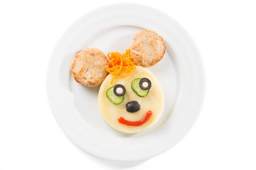 mashed potatoes with meatballs on a plate