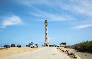 California Lighthouse on blue sky background, Aruba coastline. Nice landscape background.