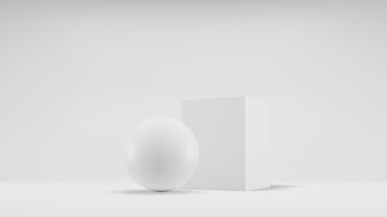Sphere and cube in a white photo studio