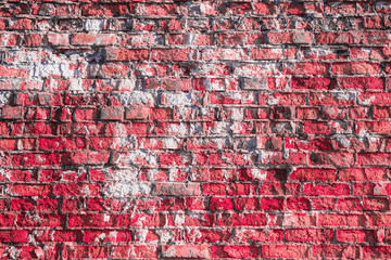 Old fancy pink and white brick wall texture. Dirty colorful grunge wall background