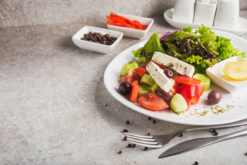 Fresh greek salad with feta cheese and olives