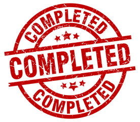 completed round red grunge stamp