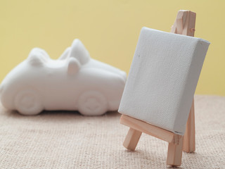 easel with blank canvas