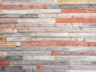 Natural wood board. colored red planks texture background