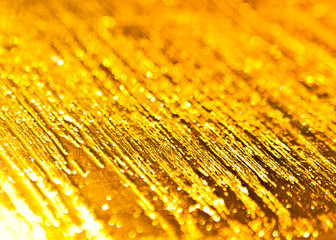  The background of the golden shine texture.