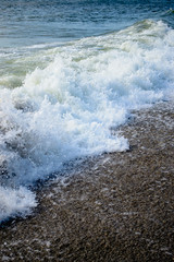 sea waves wash the sandy coast