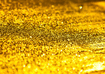  The background of the golden shine texture.