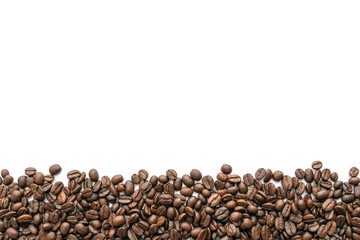 Roasted coffee beans on white background. Close-up.