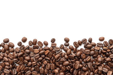 Roasted coffee beans on white background. Close-up.