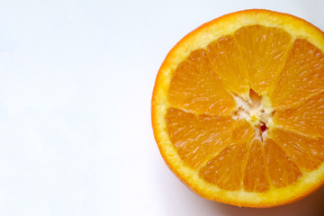 Slice of orange isolated on white background