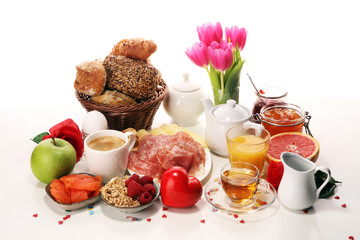 breakfast on table with bread buns, croissants, coffe and juice on carnival