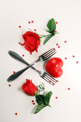 Festive table setting for Valentine's Day with forks and hearts