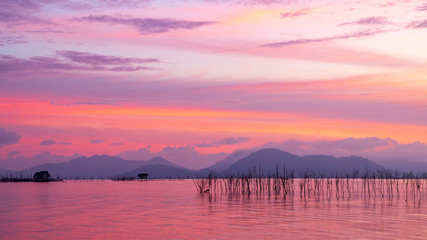 Mountains and conttage in sea
