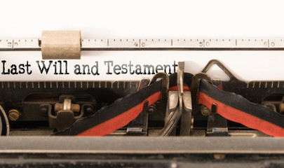 words Last Will and Testament written on vintage manual typewriter
