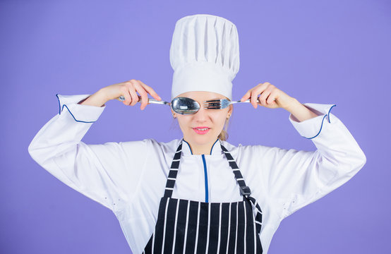 Professional cook of culinary school. Culinary arts academy. Culinary school concept. Woman professional chef hold utensil spoon fork having fun. Time to eat. Appetite and taste. Traditional culinary