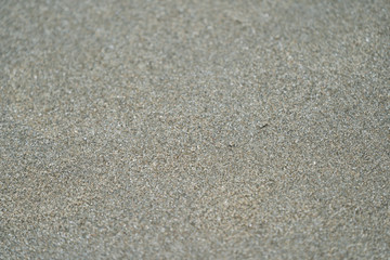 Close up / macro dark brown and black sand.