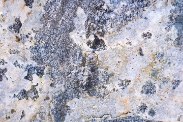 Stones texture background. Texture in multi-colored granite stone.