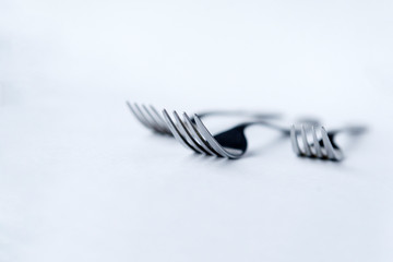 3 metal plugs on white, background, Cutlery