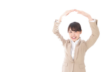 OKのサインをするビジネスウーマン