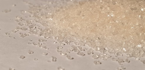 Sugar close-up. Pour the sugar.