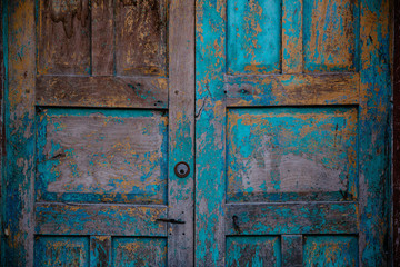 old textured turquoise door