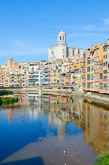 View of Bridge of Saint Augustine across River Onyar, Cathedral and buildings of city of Girona, Spain