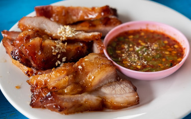 tasty slice grilled pork with Thai spicy sauce