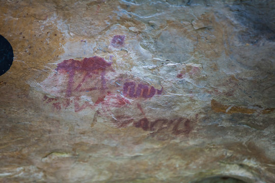 Prehistoric paintings on rock known as petroglyphs in the municipality of Facatativa in Colombia