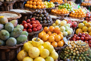 Baskets of passion fruit and other exotic fruits.