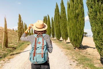 Vacation and travel in famous cypress alley, Tuscany and Italy tourist destination