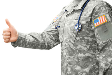 US Army doctor showing thumb up - studio shot