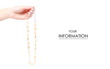 Beads stones ivory in hand pattern on a white background isolation