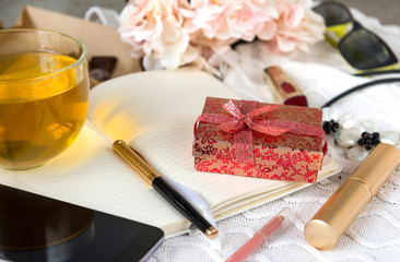 tea mug,  notebook, phone, gadget, smartphone, pen, necklace, flowers, perfume bottle, perfume, women's stuff, lipstick, hydrangea, gift box, glasses
