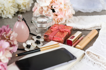 phone, gadget, smartphone, pen, necklace, flowers, perfume bottle, perfume, women's stuff, lipstick, hydrangea, gift box