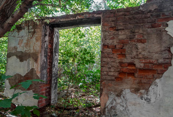 Fragment of the wall of the old destroyed building. Old architecture. Ust-Kamenogorsk. Ruined building